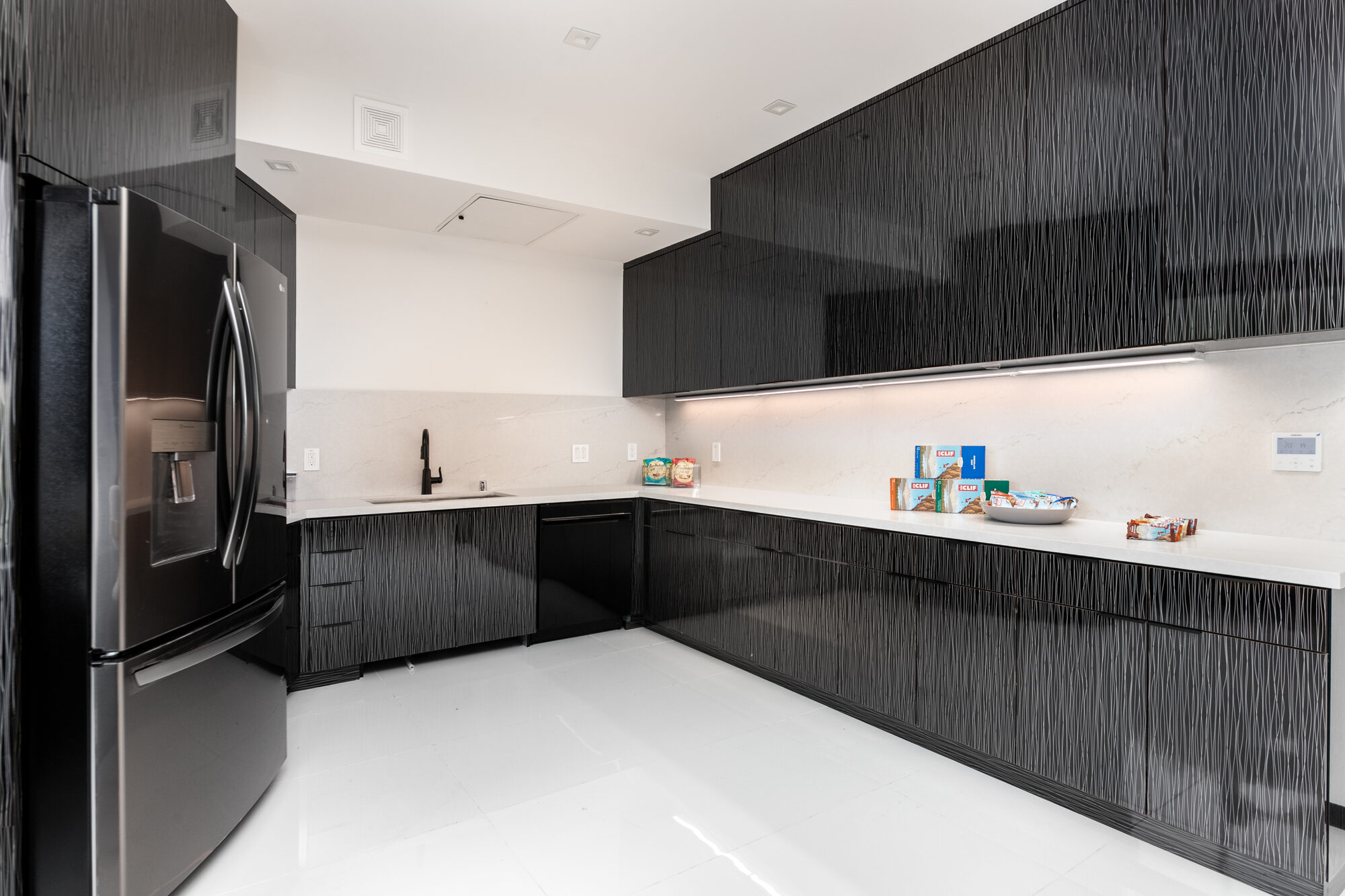 Commercial break room cabinetry at 11440 San Vicente, Los Angeles — ATA Custom Cabinets
