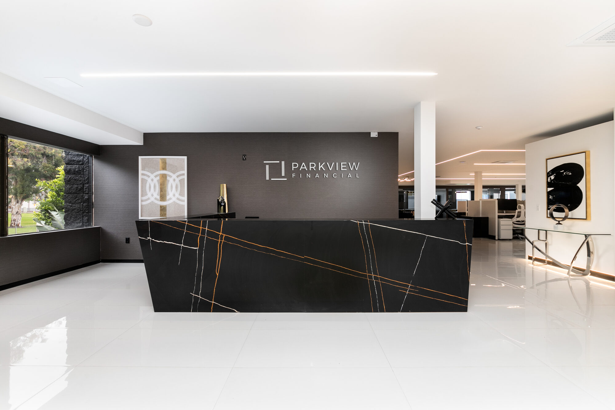 Custom commercial lobby millwork at 11440 San Vicente, Los Angeles — ATA Custom Cabinets